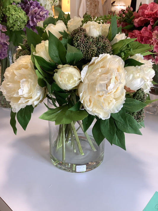 White Peony Flowers in a glass Vase